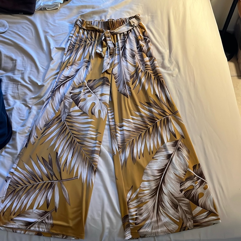 Yellow long flowey pants with brown palms